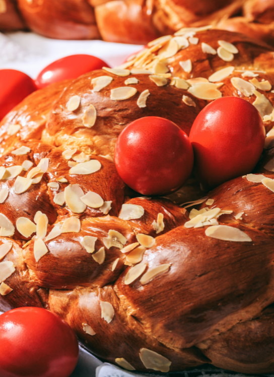 
Traditional Greek Easter tsoureki bread with red eggs served at ON Residence Hotel