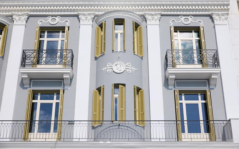 ON Residence Hotel exterior with neoclassical design, ornate balconies and classic windows