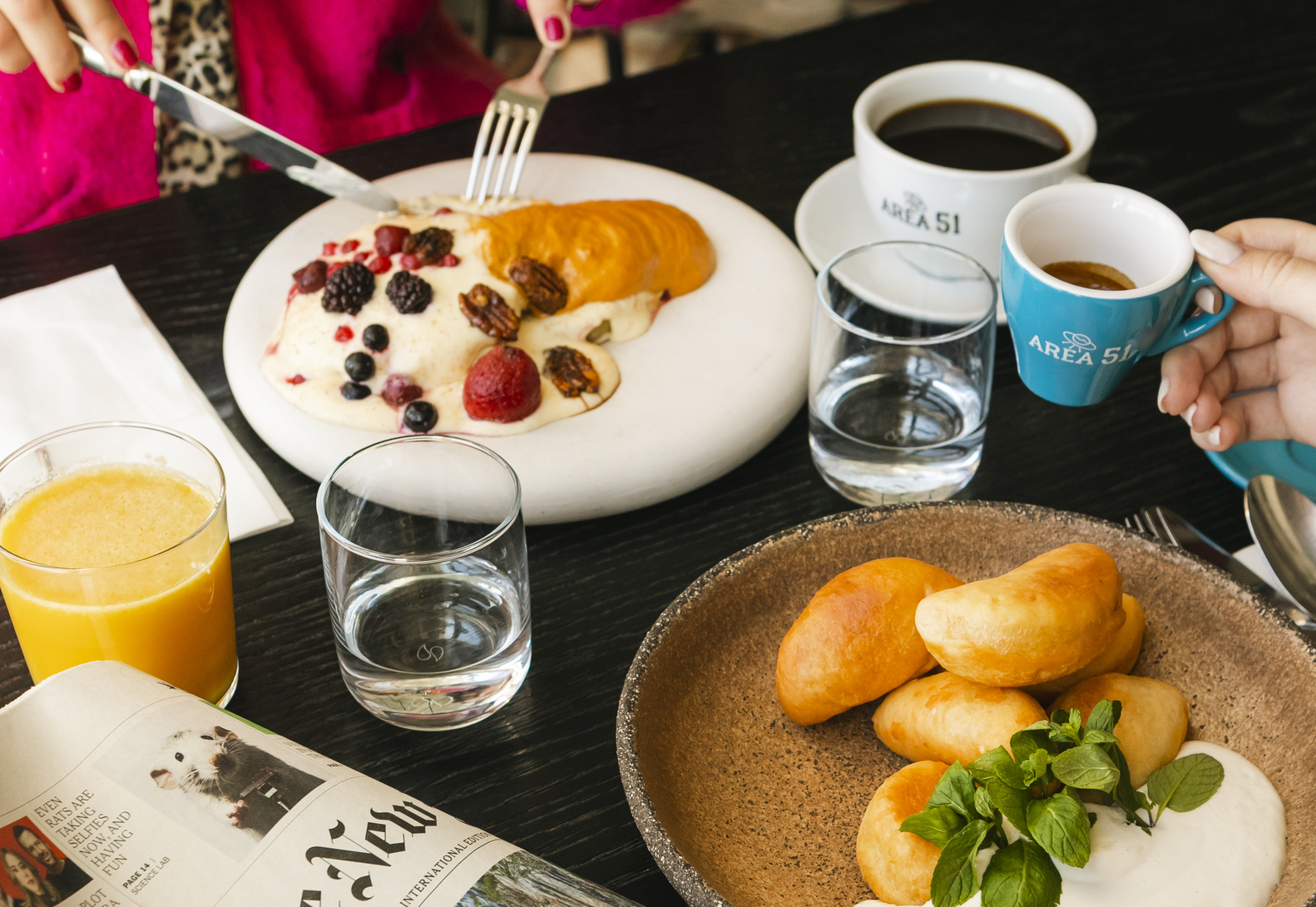 
Breakfast with pastries, fruit pancakes, coffee and juice at Tiger Loop Bar in ON Residence Hotel