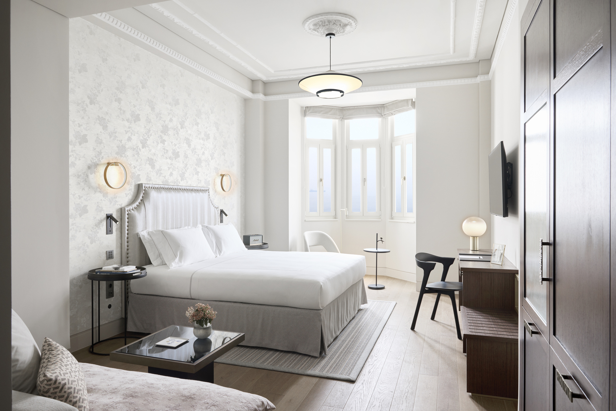 
Junior suite seafront Oriel with king bed, elegant decor, desk and panoramic sea view windows at ON Residence Hotel